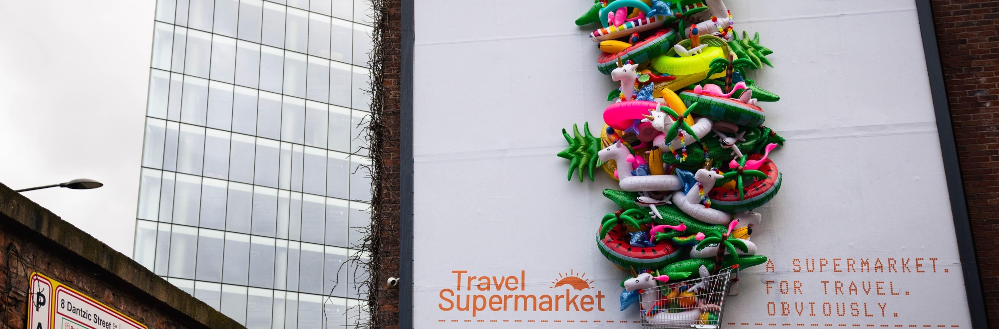 Huge 3-D TravelSupermarket trolley filled with inflatables blows up in Manchester