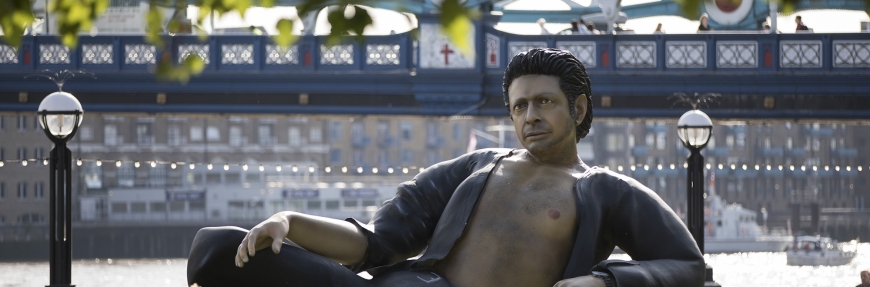 A giant statue of Jeff Goldblum next to London’s Tower Bridge celebrates 25 years of Jurassic Park