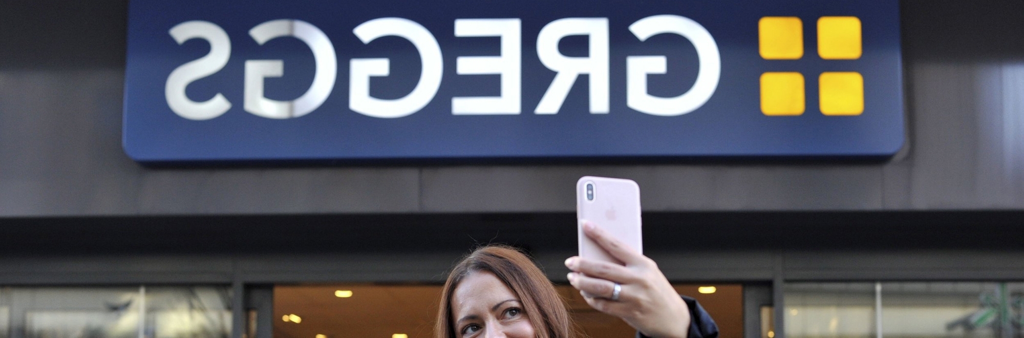 Greggs reverses its shop sign to reflect brilliantly in Fenwick’s window