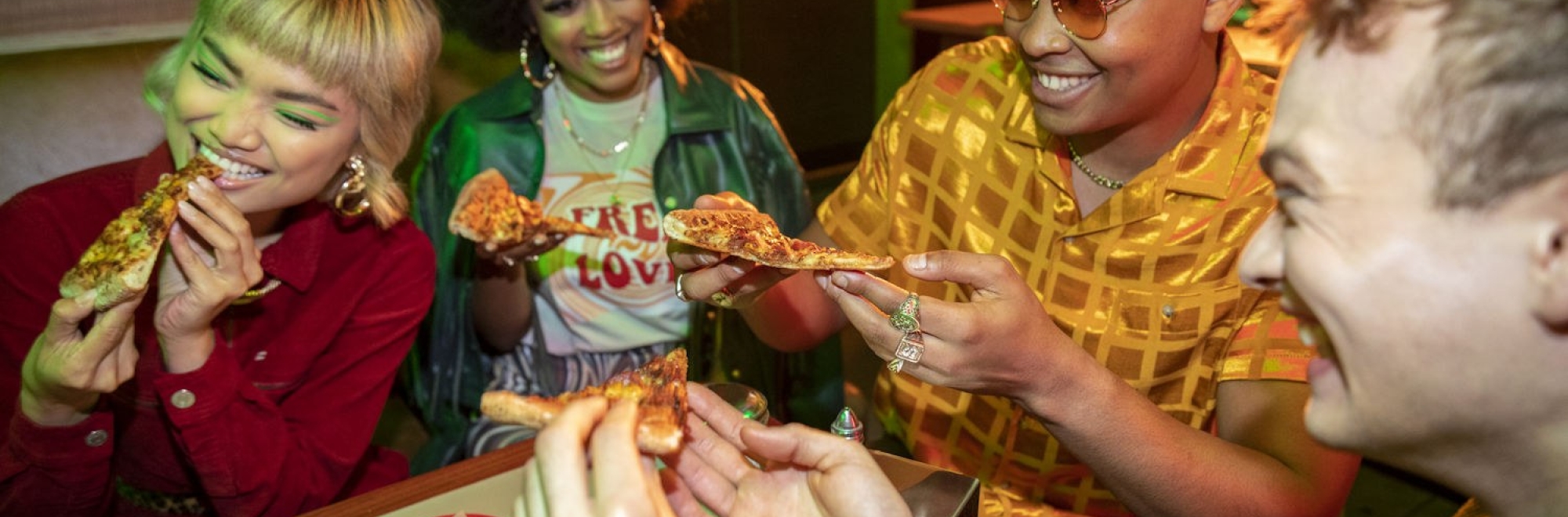 Papa John’s new global campaign turns a pizza shop into a pizza party